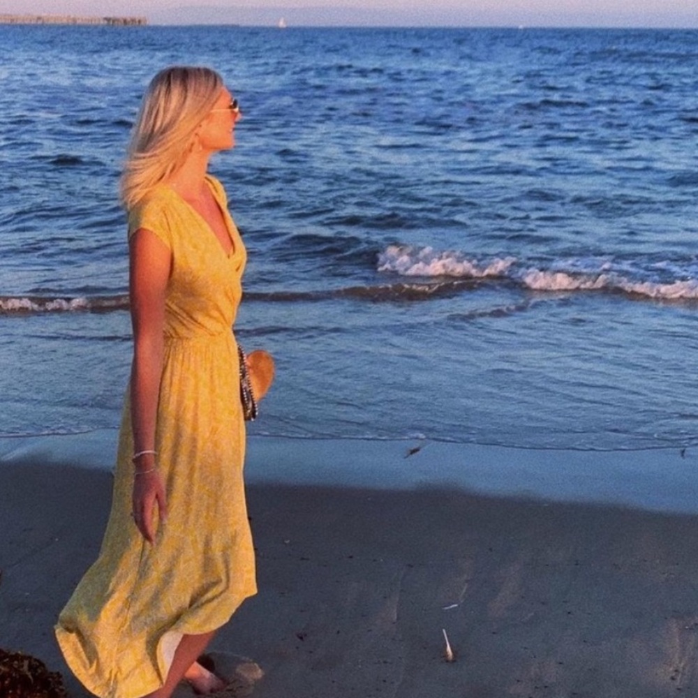 Anthro’s Maeve sunny yellow Midi Dress